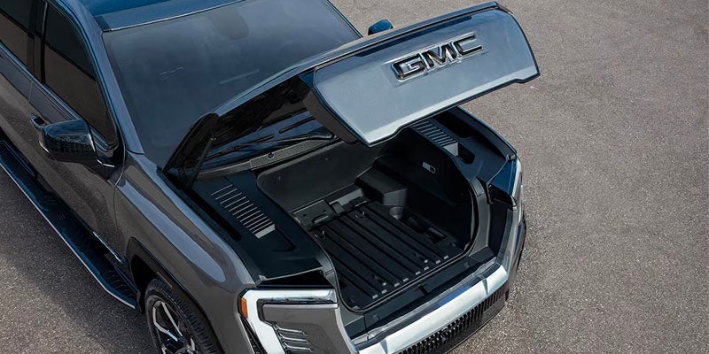 2025 GMC Sierra EV with an open trunk