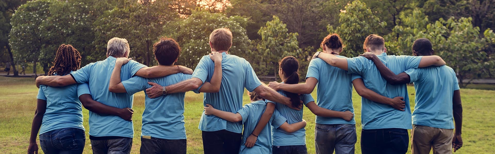 Group of people hugging eachother